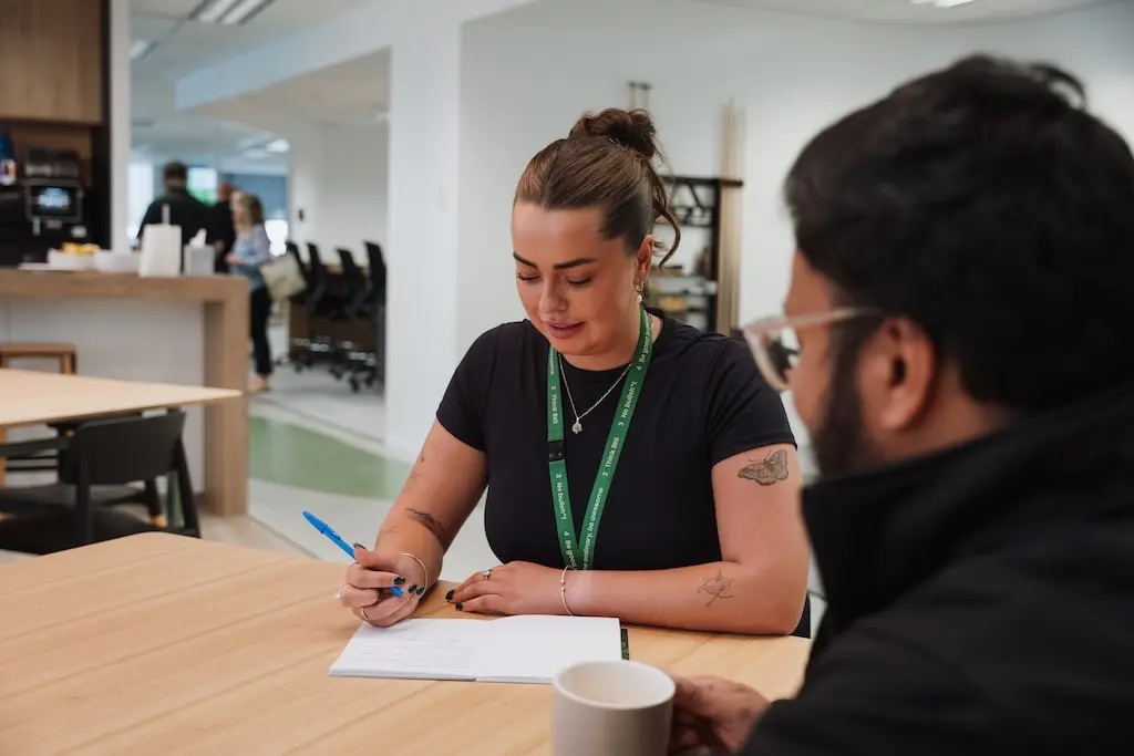 Two people working on a project